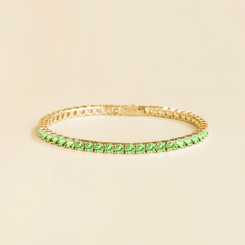 Ciclo gold tennis bracelet set with Green sapphires
