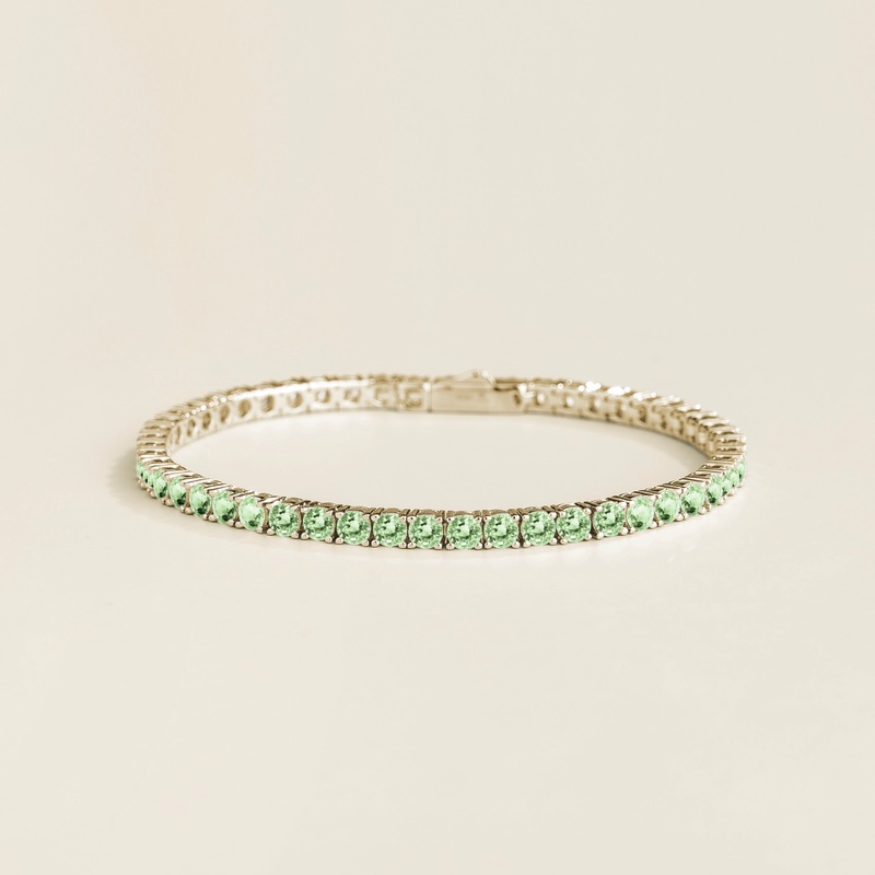 Ciclo white gold tennis bracelet set with Green sapphire