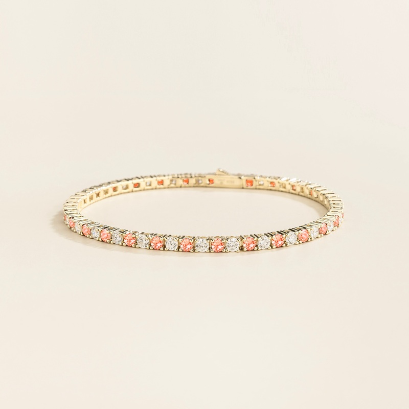 Ciclo white gold tennis bracelet set with Padparadscha sapphire and Diamond