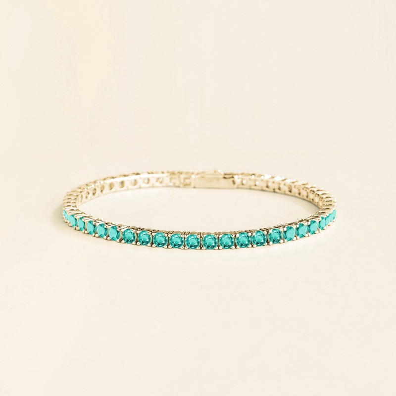 Ciclo white gold tennis bracelet set with Paraiba sapphire